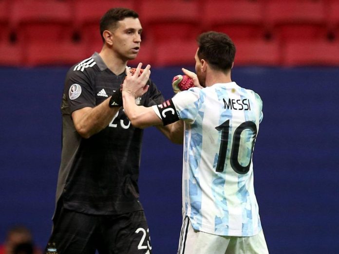 Emiliano Martinez and Lionel Messi