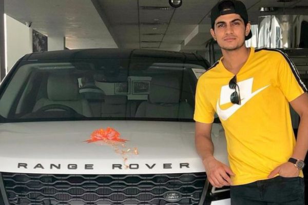Shubman gill with his range rover car